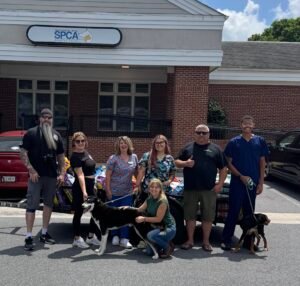 The Dog Poop Dudes with the Winchester SPCA staff